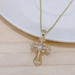 A single-piece white gold cross necklace with a vintage-style pendant, this fashionable choker is suitable for everyday wear, pa